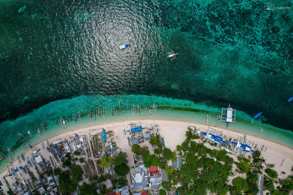 A good top view of Malapascua beach with boats and clear waters